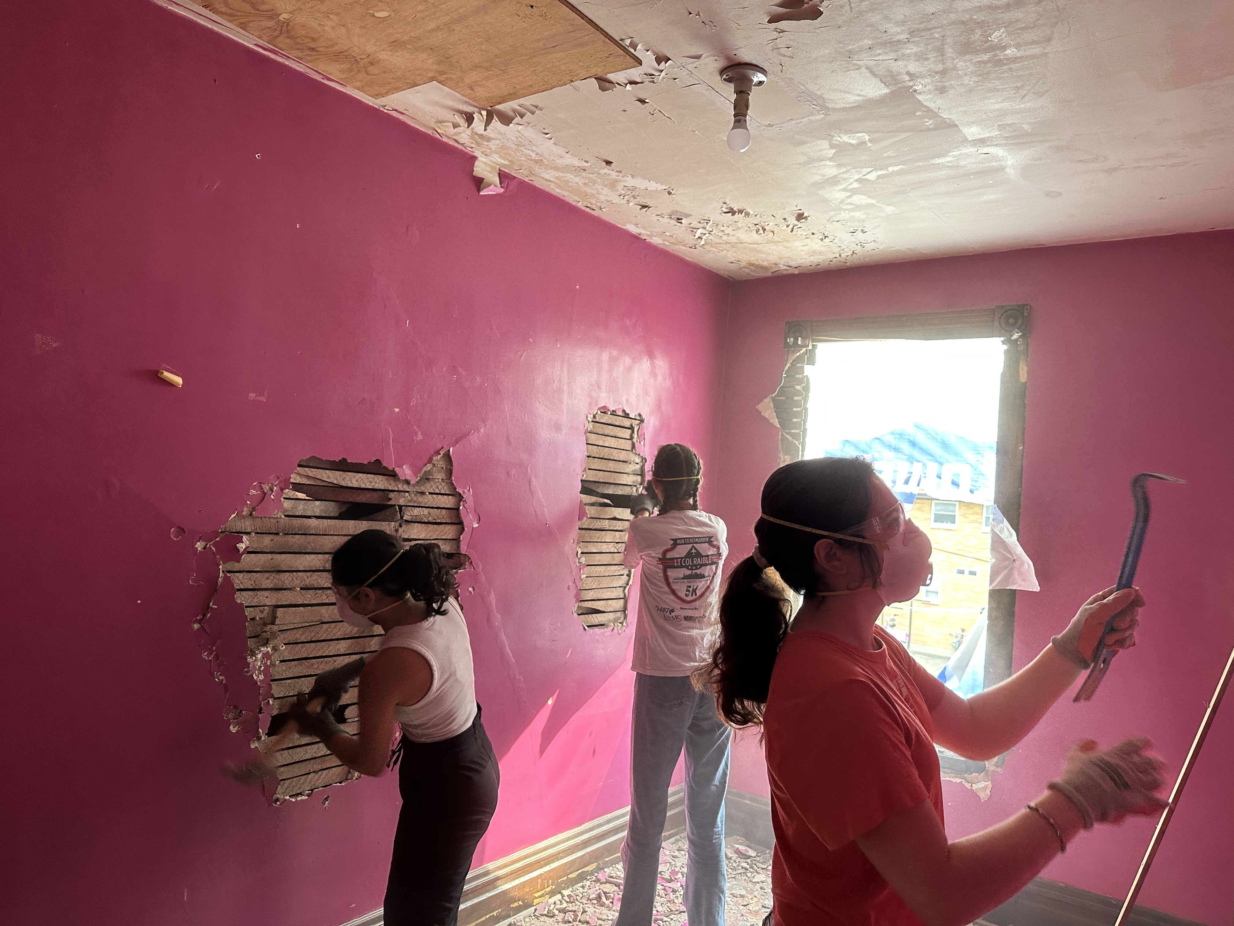 Volunteers doing demolition work at our Armstrong County Habitat for Humanity workday.